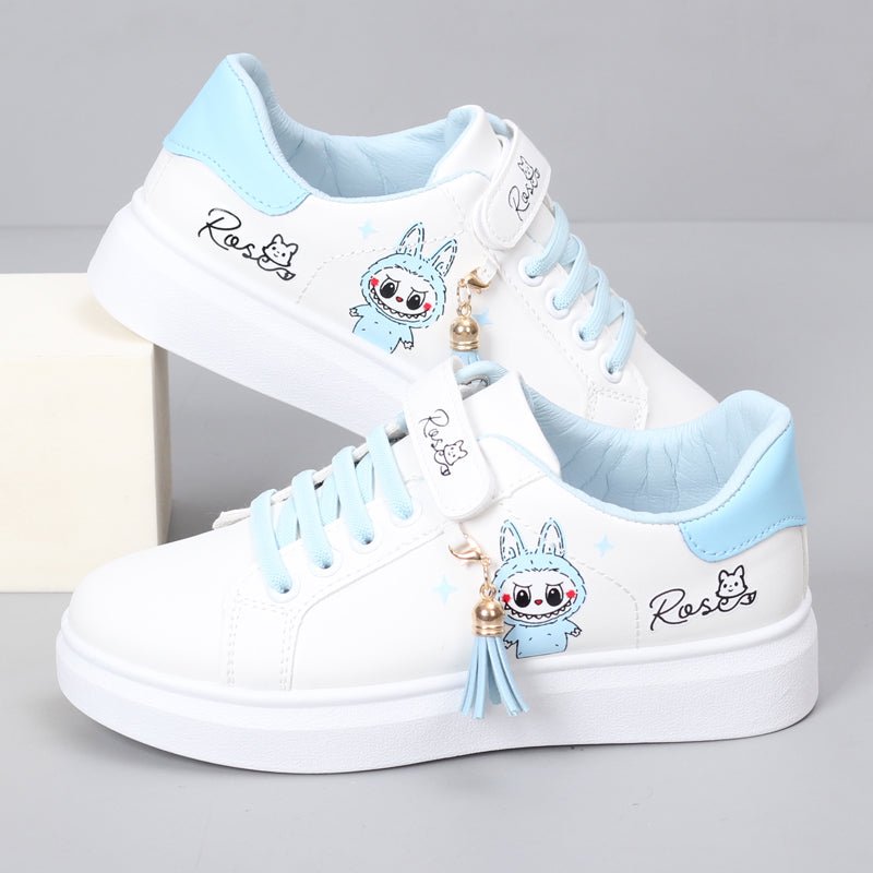 Girls white PU leather low ankle sports board shoes, stylish kids sneakers with flat soles and magic stick closures.