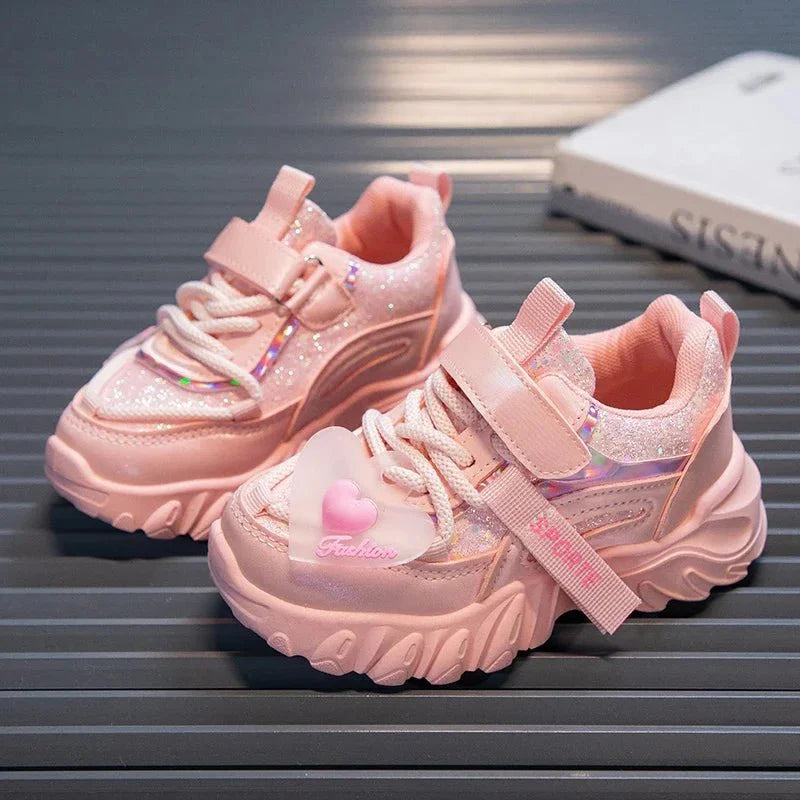 Girls running sneakers by SHOWLU FASHION STORE, shiny non-slip kids’ sports shoes with heart design for casual and school wear.