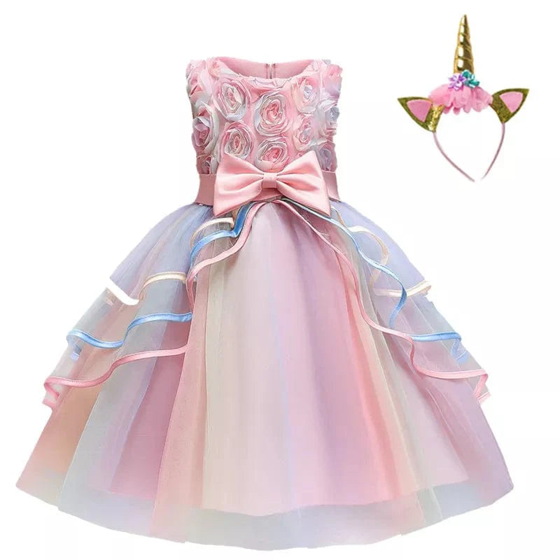 Pink unicorn rainbow layered ball gown for girls, featuring floral and bow details, perfect for parties or special occasions.