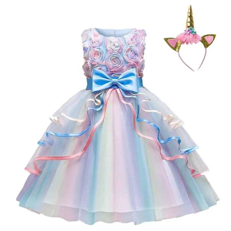 Pink unicorn rainbow layered ball gown for girls, featuring floral and bow details, perfect for parties and special occasions.