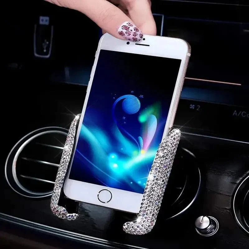 Glitter car phone holder by SHOWLU FASHION STORE, rhinestone gravity air vent mount for GPS and mobile phones in a vehicle.