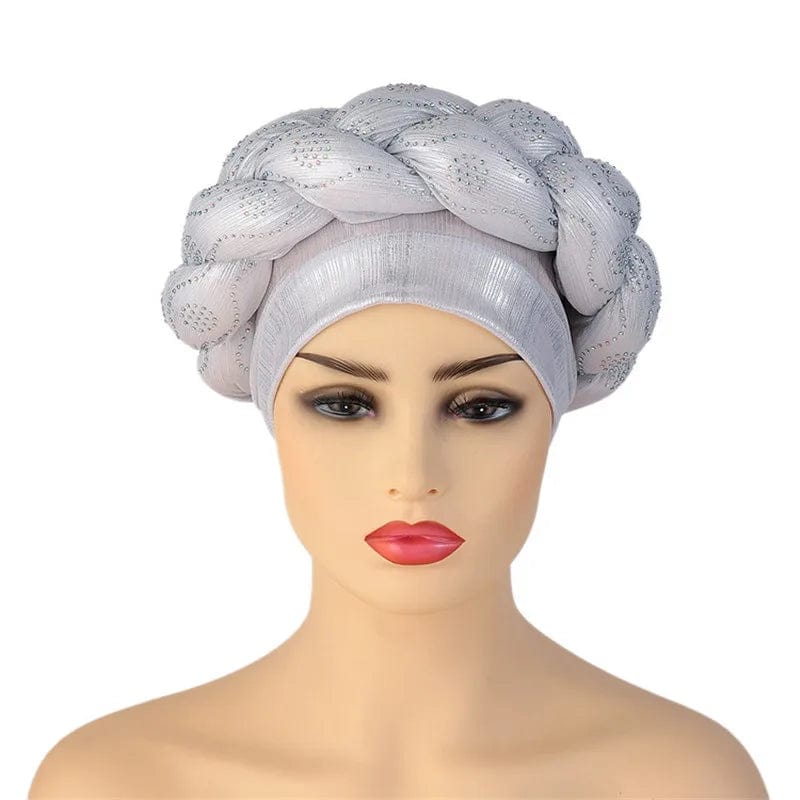 African Autogele headtie by JJYANJIN featuring glitter diamond design, styled as a women's turban cap with braided accents