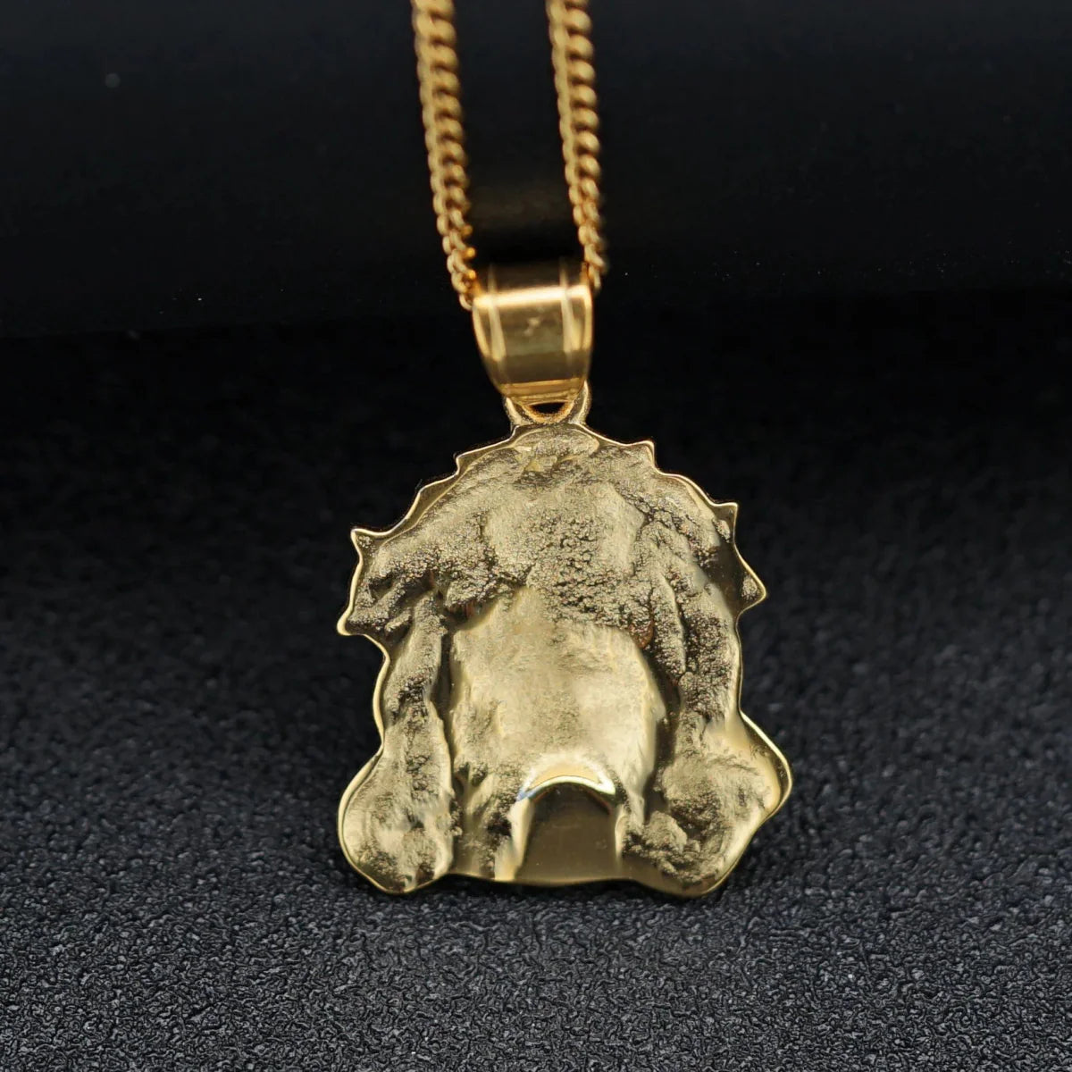 Gold stainless steel Jesus charm pendant necklace for women and men, stylish jewelry for parties and gifts.