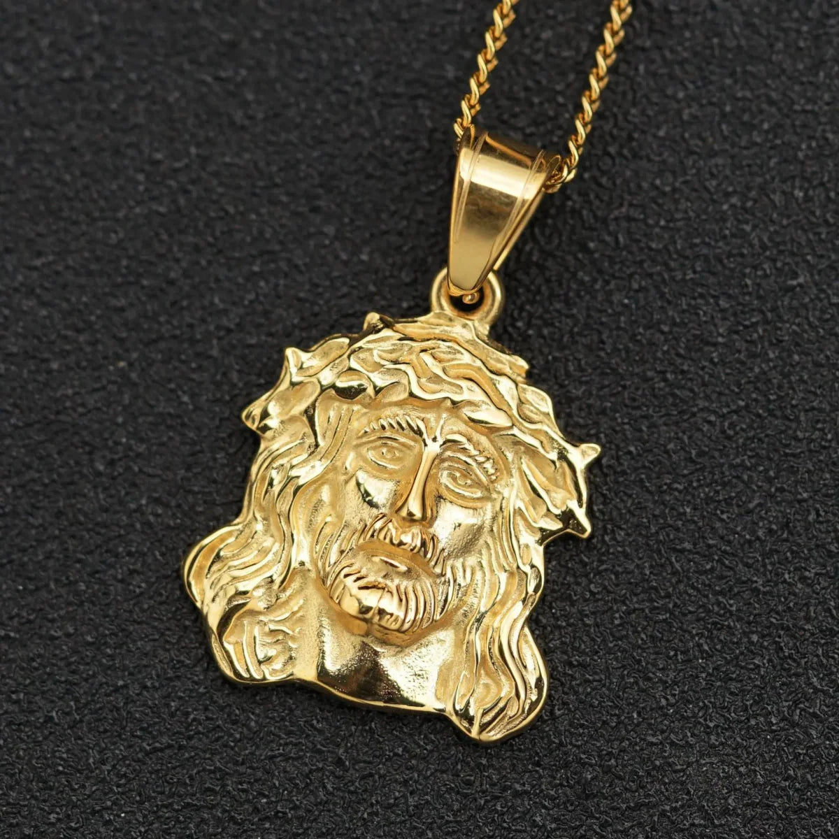 Gold stainless steel Jesus charm pendant necklace for women and men, stylish religious jewelry for parties or gifts.