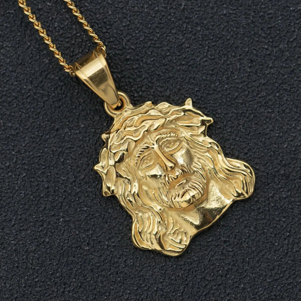 Gold stainless steel Jesus charm pendant necklace, unisex jewelry for women and men, stylish religious accessory for parties and gifts.