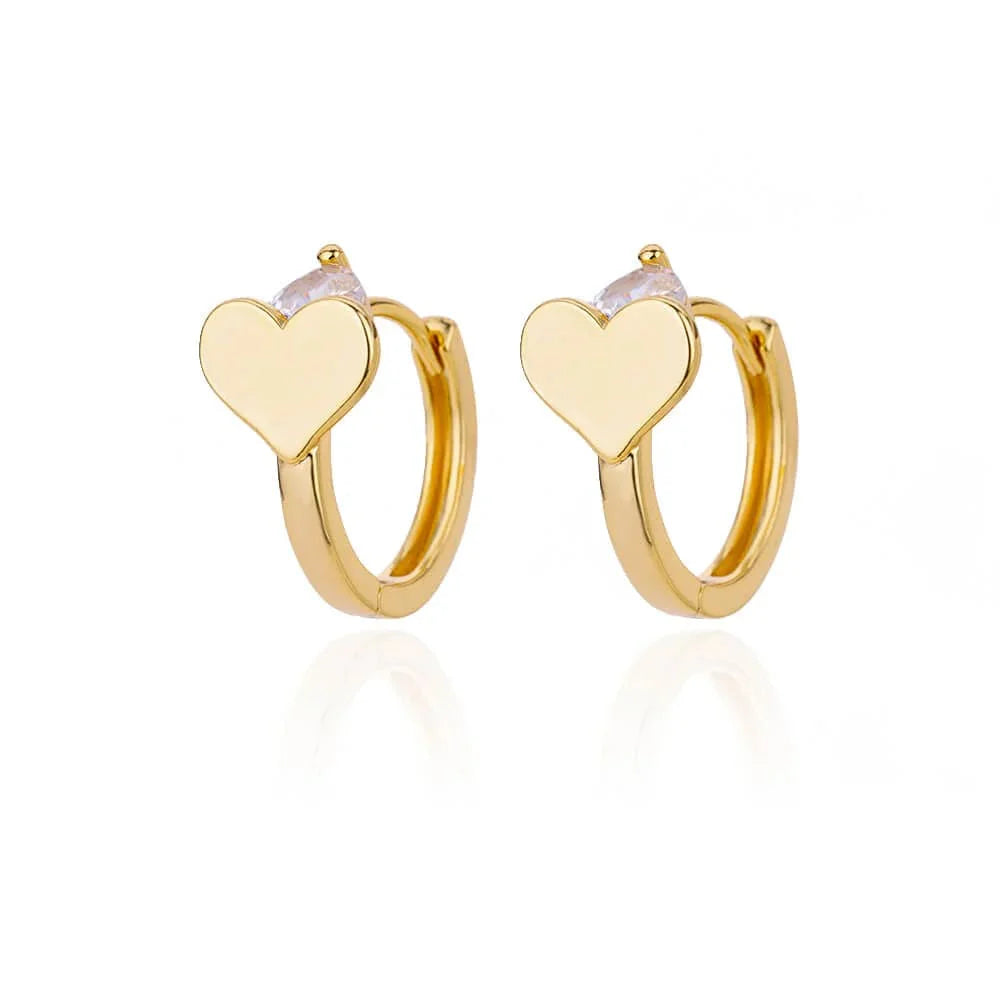 Gold stainless steel heart zircon stud earrings for women, delicate hoop-style jewelry suitable for weddings and parties.