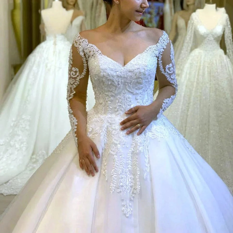 Showlu Fashion V-Neck Tulle Ball Gown wedding dress with full lace sleeves, elegant appliques, and a graceful, custom-made design.