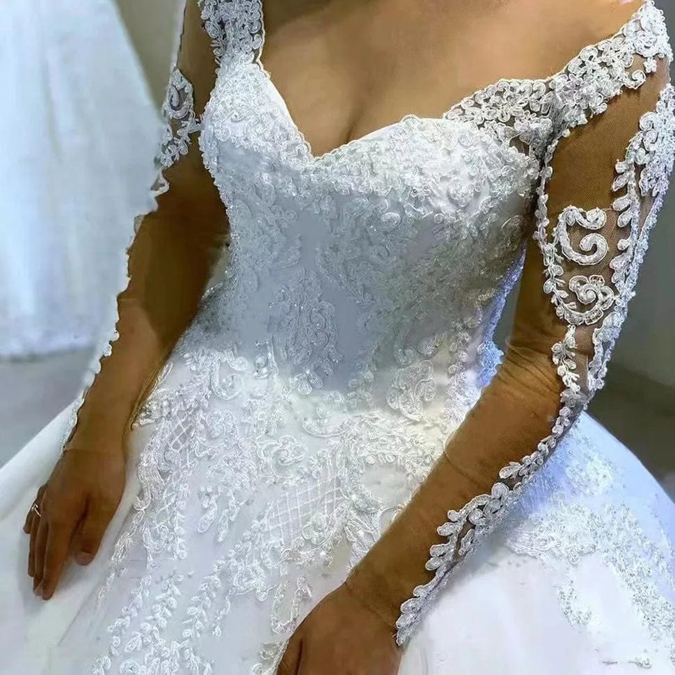 Showlu Fashion V-Neck Tulle Ball Gown wedding dress with full lace sleeves and appliques, perfect for a graceful bridal look.