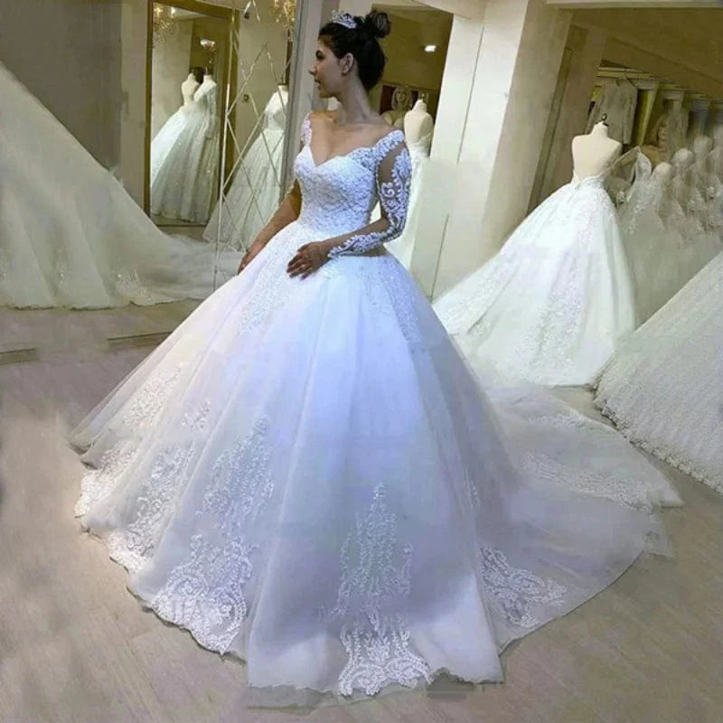 Elegant QQ Lover V-Neck Tulle Ball Gown wedding dress with full lace sleeves and intricate appliques, designed by Showlu Fashion.