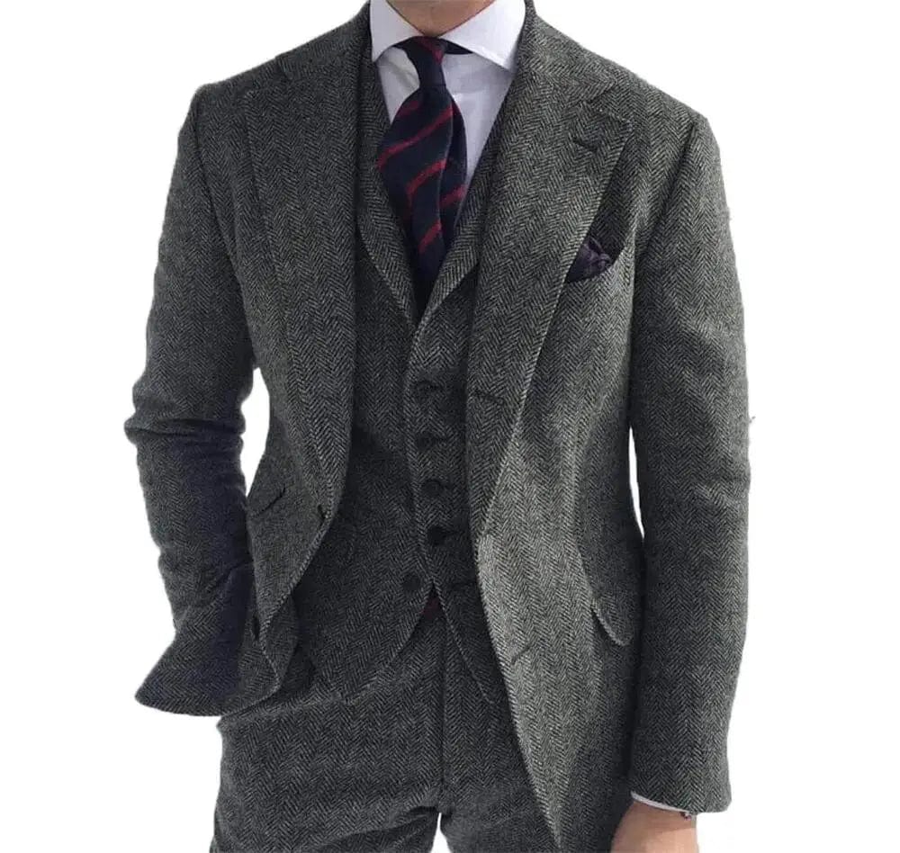 Gray herringbone wool tweed 3-piece men's winter suit with slim fit jacket, vest, and pants, ideal for formal occasions and weddings.