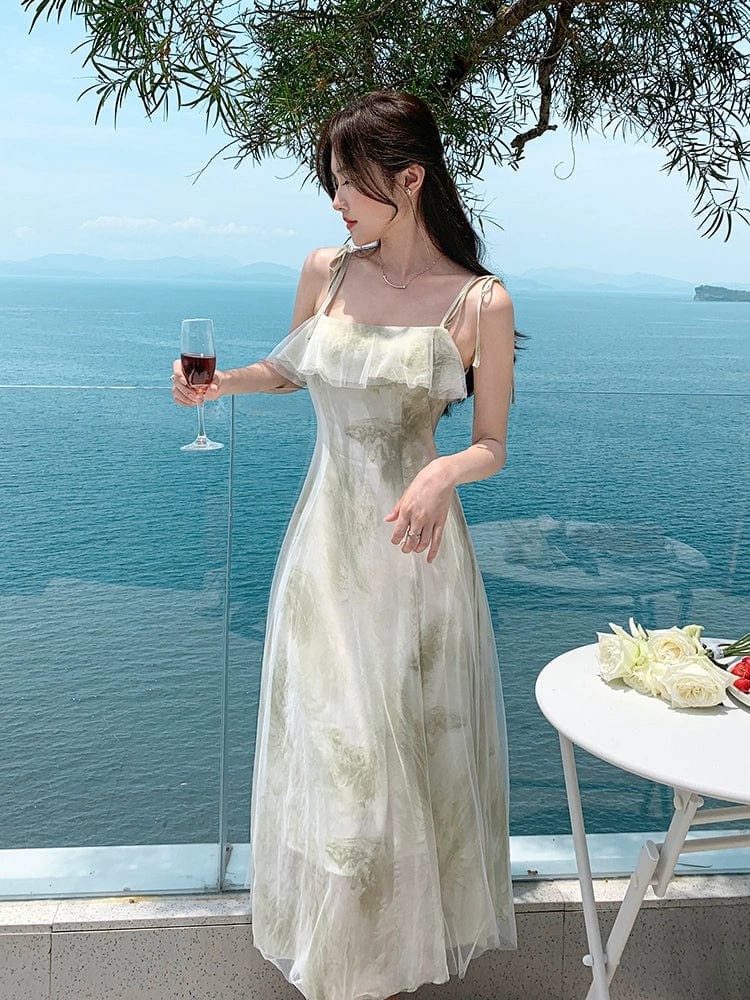 Green chiffon fairy holiday dress with off-shoulder style by Showlu Fashion, featuring flowing fabric and elegant design.