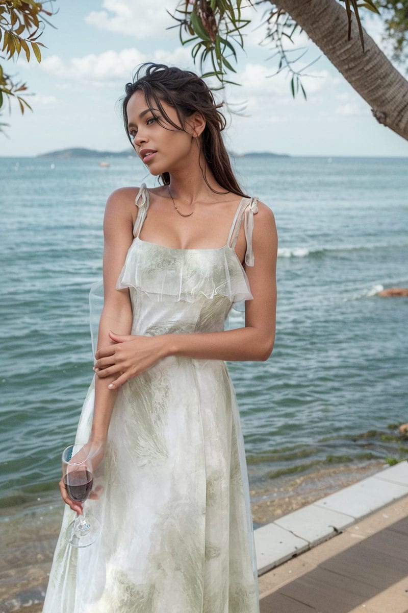 Green chiffon fairy holiday dress with off-shoulder style by Showlu Fashion, featuring flowy fabric and elegant design.