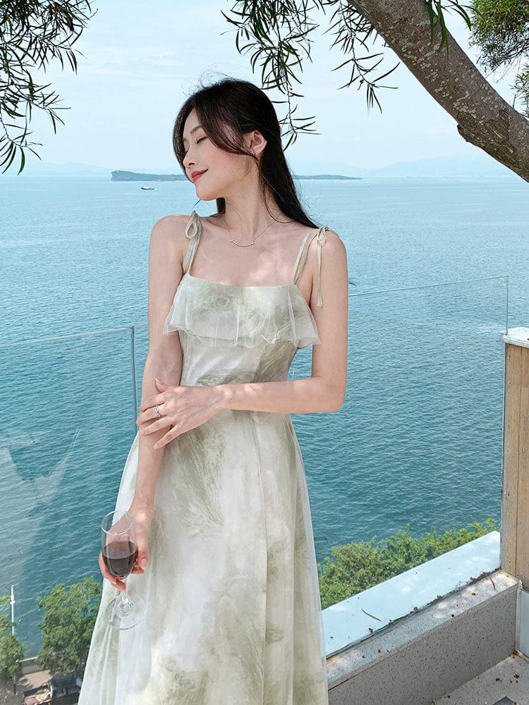 Green chiffon fairy holiday dress by Showlu Fashion, off-shoulder style with flowing fabric and elegant design.