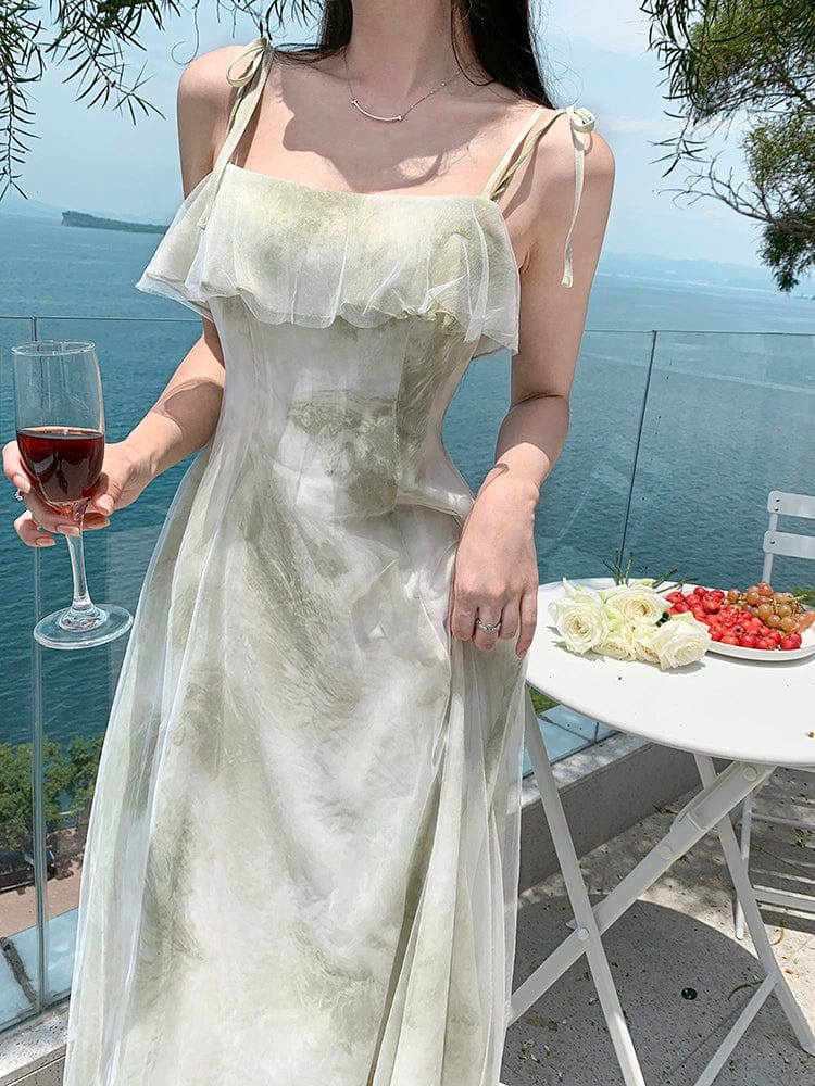 Green chiffon fairy holiday dress with off-shoulder style, featuring flowing fabric and delicate design by Showlu Fashion.