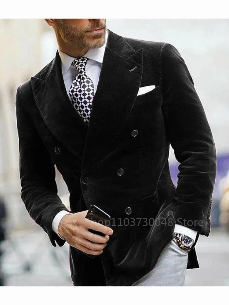 Men's velvet double-breasted blazer with peak lapel in green and black, elegant evening suit for formal occasions.