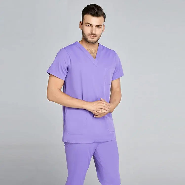 Grey Showlu unisex jogger scrub suit set, slim fit medical nursing uniform for doctors and nurses in hospital clinical settings.