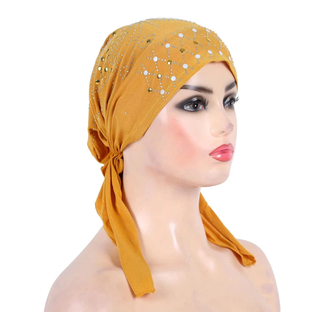 Gold sequin linen turban hijab by Showlu Fashion, stylish Muslim headwrap with pull-on design and elegant embellishments.