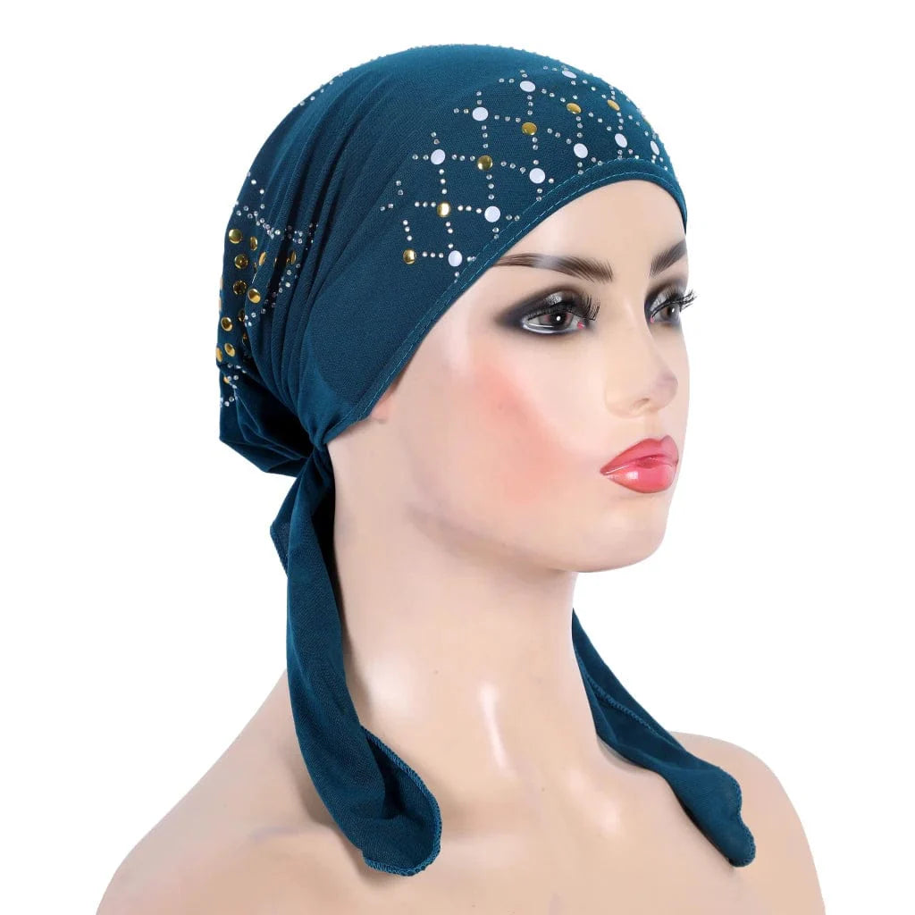 Gold sequin linen turban hijab by Showlu Fashion, stylish Islamic headwrap with pull-on design and elegant gold embellishments.