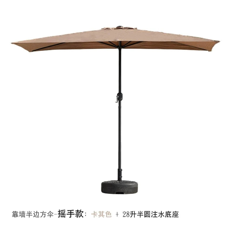 Half outdoor wall-mounted parasol by Creek Yueshui Shore, shown against a wall with green plants and a sunny garden setting.