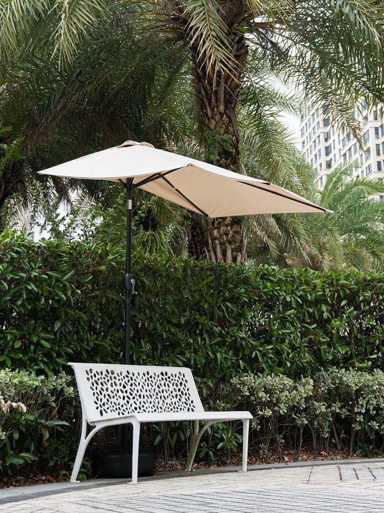 Half outdoor parasol by Creek Yueshui Shore, wall-mounted sun umbrella with green plant and balcony setting, providing shade and sun protection.