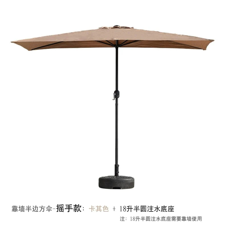 Showlu Creek Yueshui Shore Half Outdoor Parasol mounted on wall, providing shade on a balcony with green plants and outdoor seating.