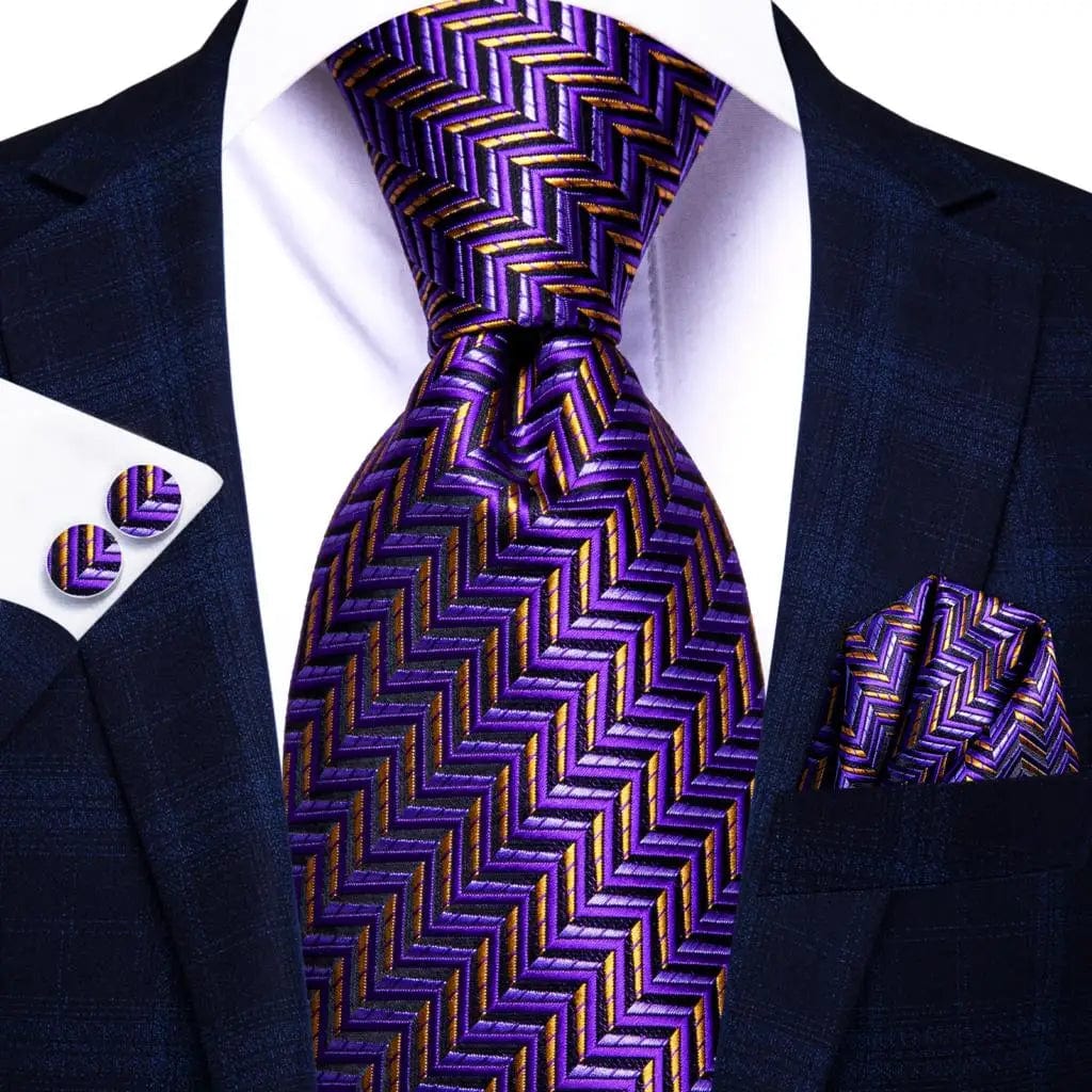 Navy blue striped silk tie set for men including necktie, matching hanky, and cufflinks, ideal for business and formal occasions.