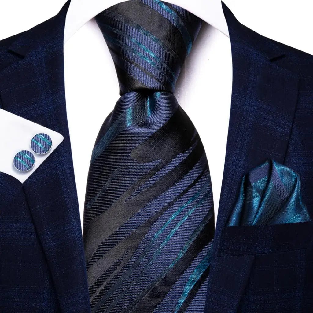 Navy blue striped silk tie set for men including necktie, pocket hanky, and cufflinks, perfect for business and formal occasions.