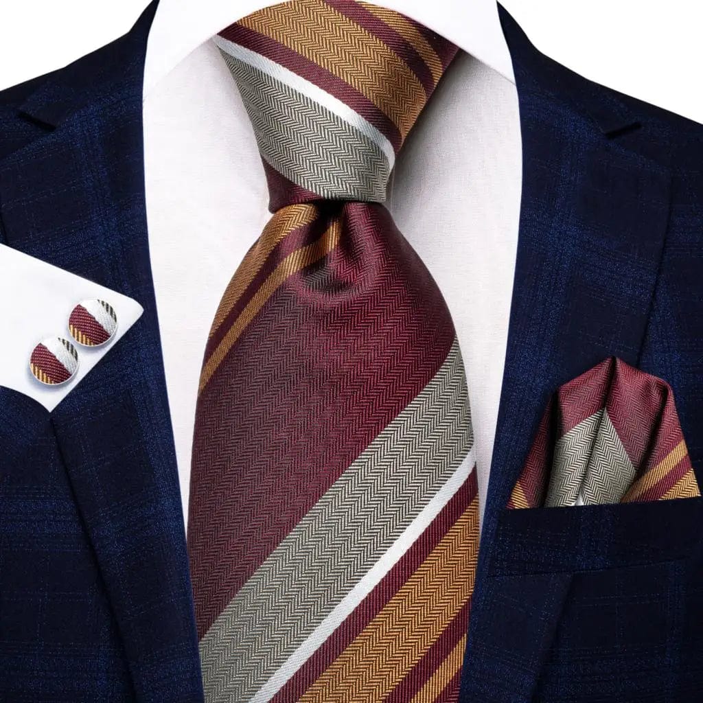 Navy blue striped silk tie set for men including necktie, pocket hanky, and cufflinks, ideal for formal and business occasions.