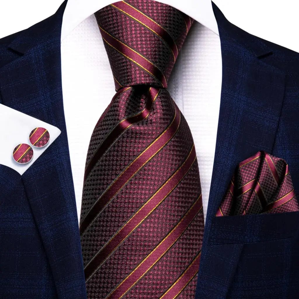 Navy blue striped silk tie set for men including necktie, pocket hanky, and cufflinks, suitable for formal and business occasions.