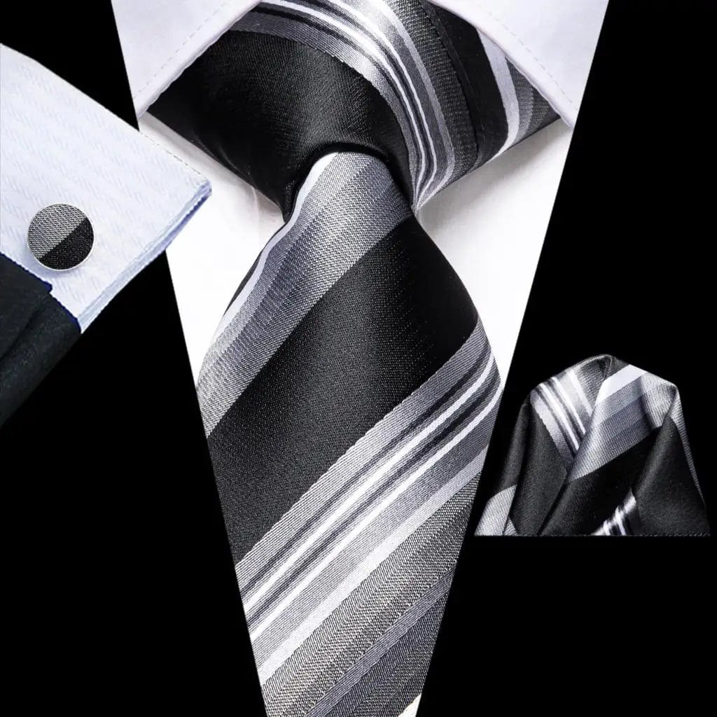 Navy blue striped silk tie set with matching hanky and cufflinks, stylish men's necktie for wedding, business, or party wear.