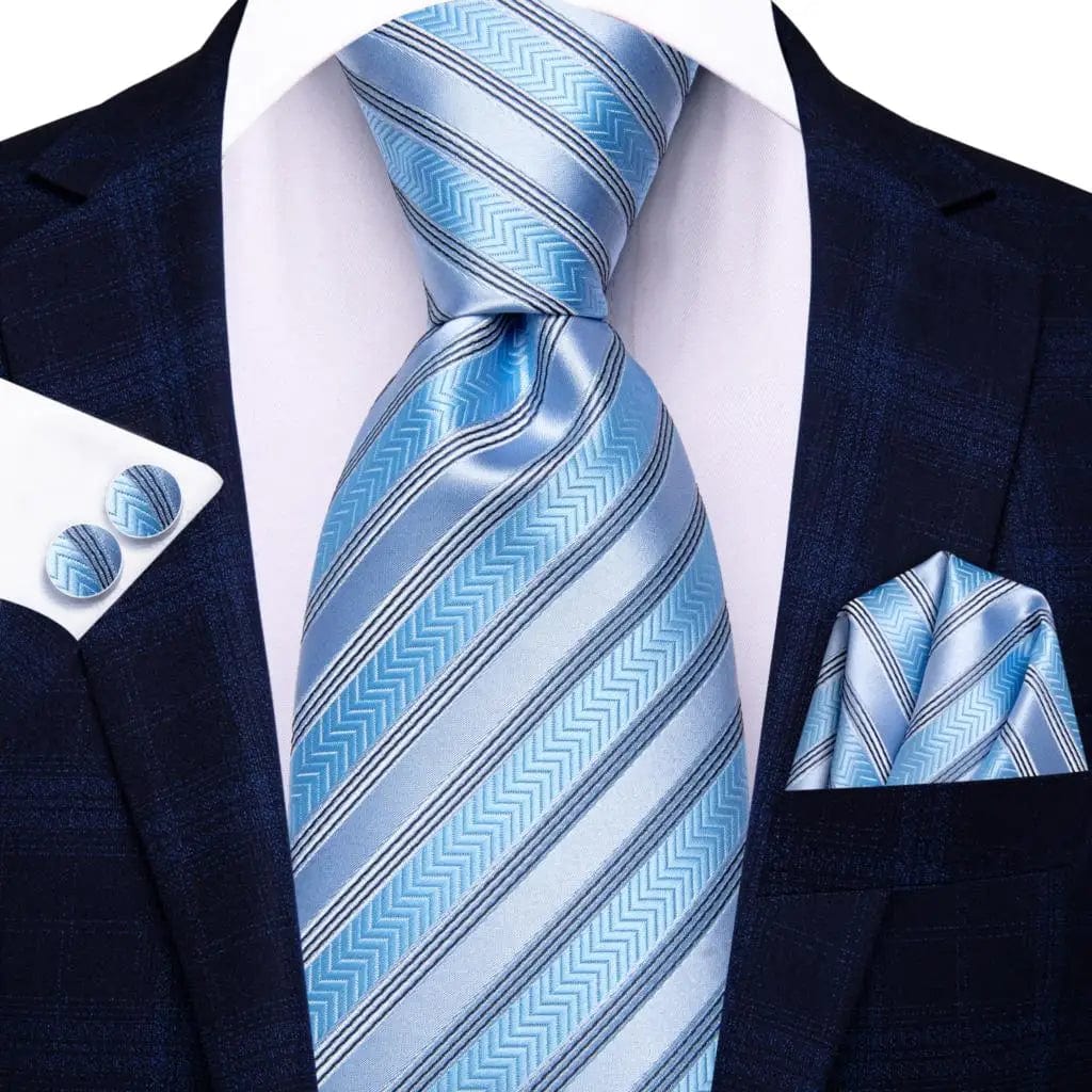 Navy blue striped silk tie set for men including necktie, pocket hanky, and cufflinks, ideal for formal and business occasions