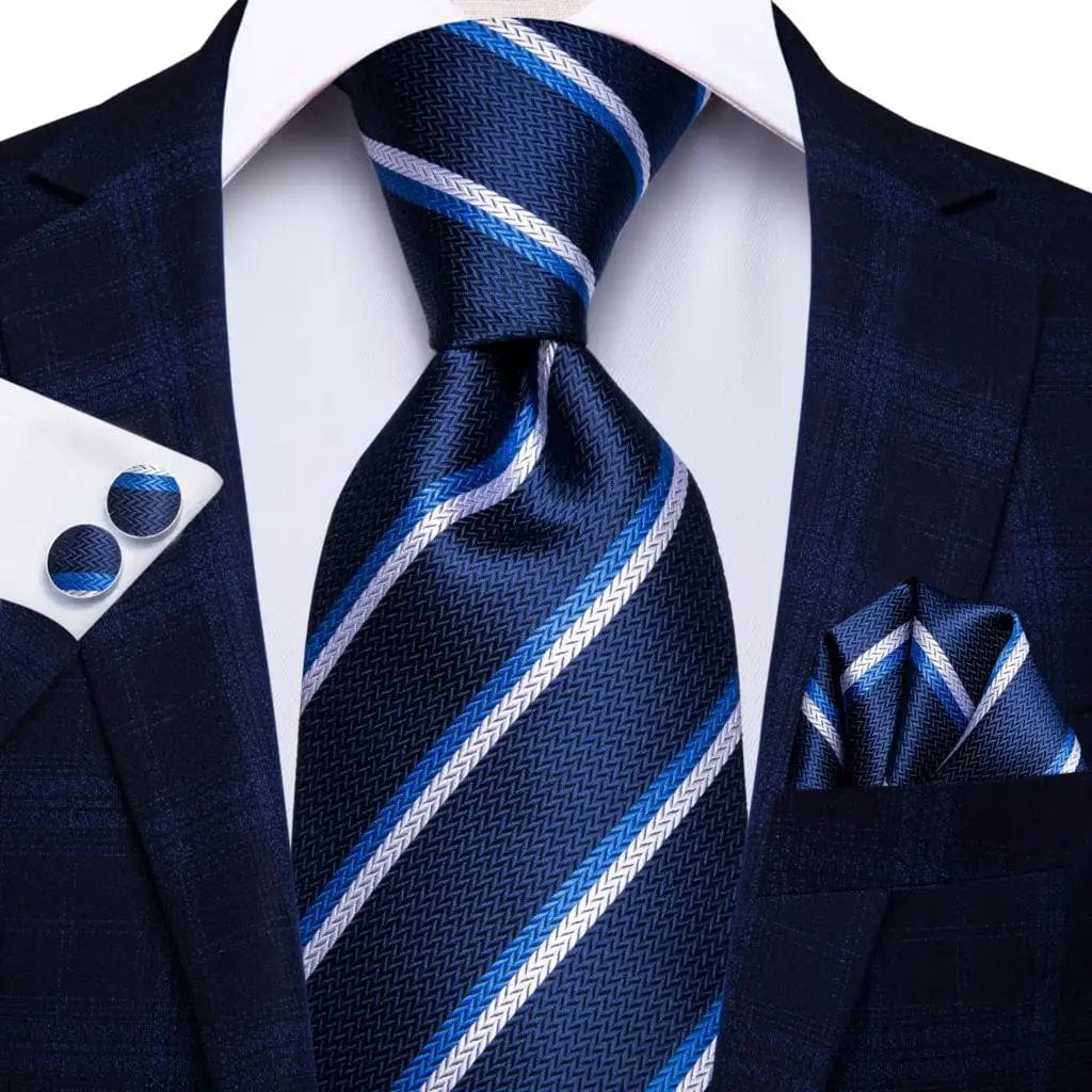 Navy blue striped silk tie set for men with matching hanky and cufflinks, perfect for business or formal occasions.