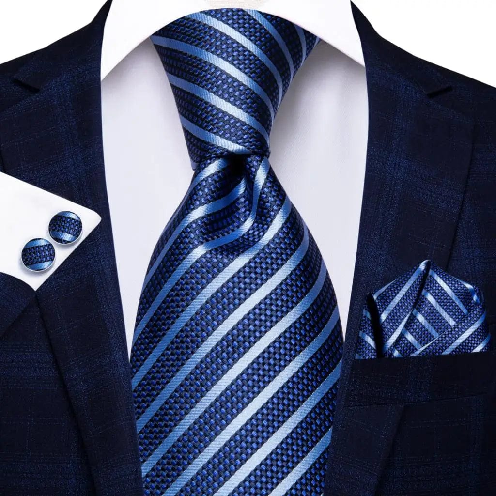 Navy blue striped silk tie set for men with matching hanky and cufflinks, perfect for business and formal occasions.