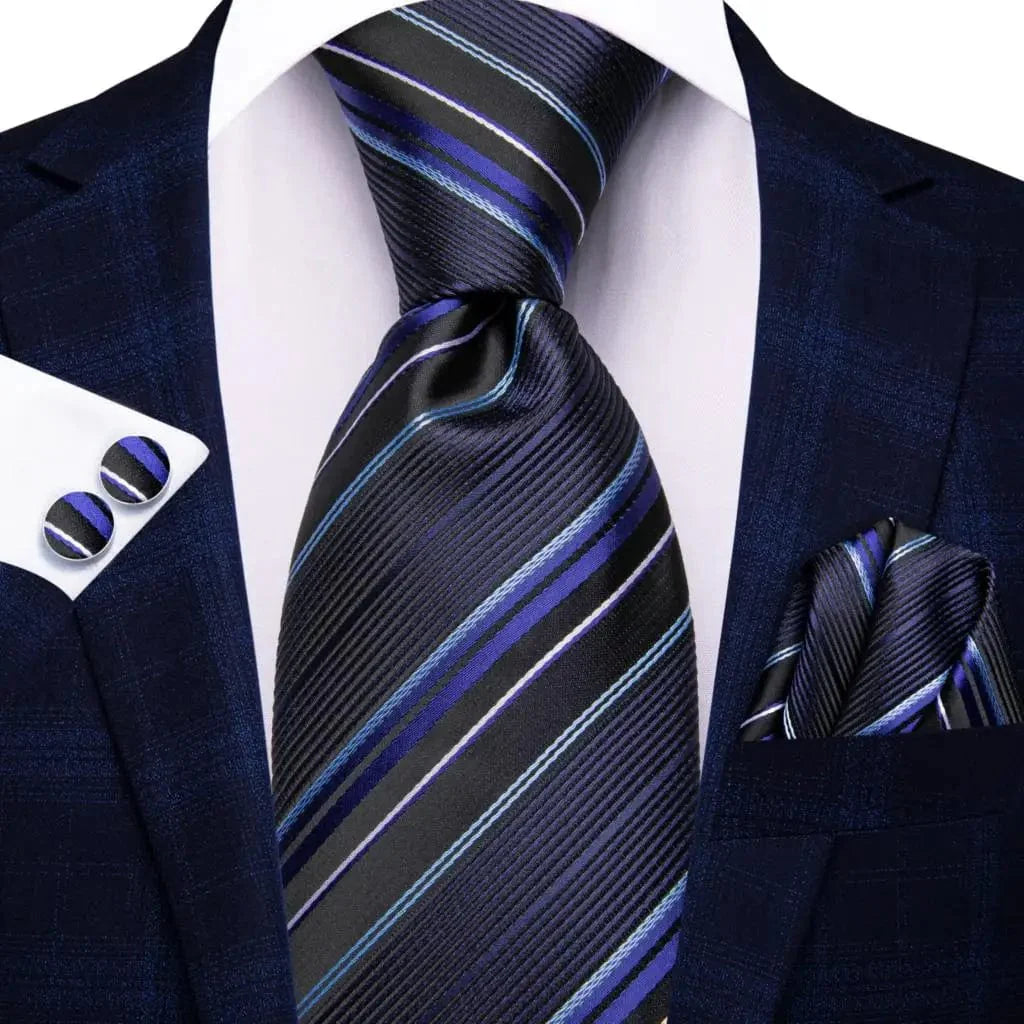 Navy blue striped silk tie set for men with matching hanky and cufflinks, perfect for formal occasions and business events.