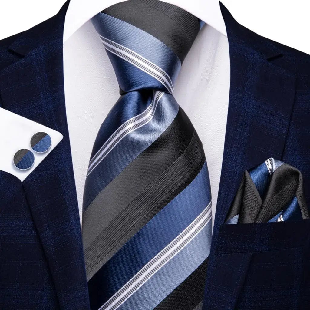 Navy blue striped silk tie set for men with matching pocket square and cufflinks, ideal for business and formal occasions.