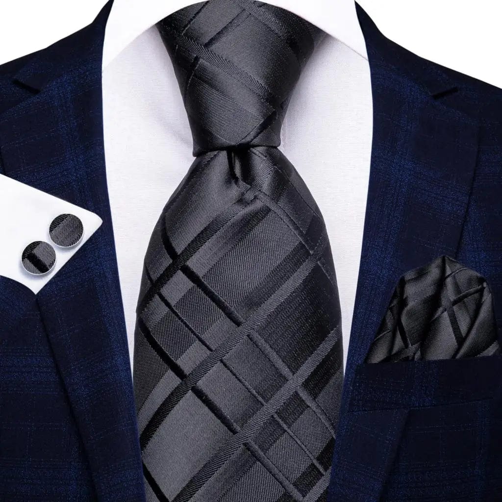 Navy blue striped silk tie set for men includes necktie, matching hanky, and cufflinks, stylish for business and formal occasions