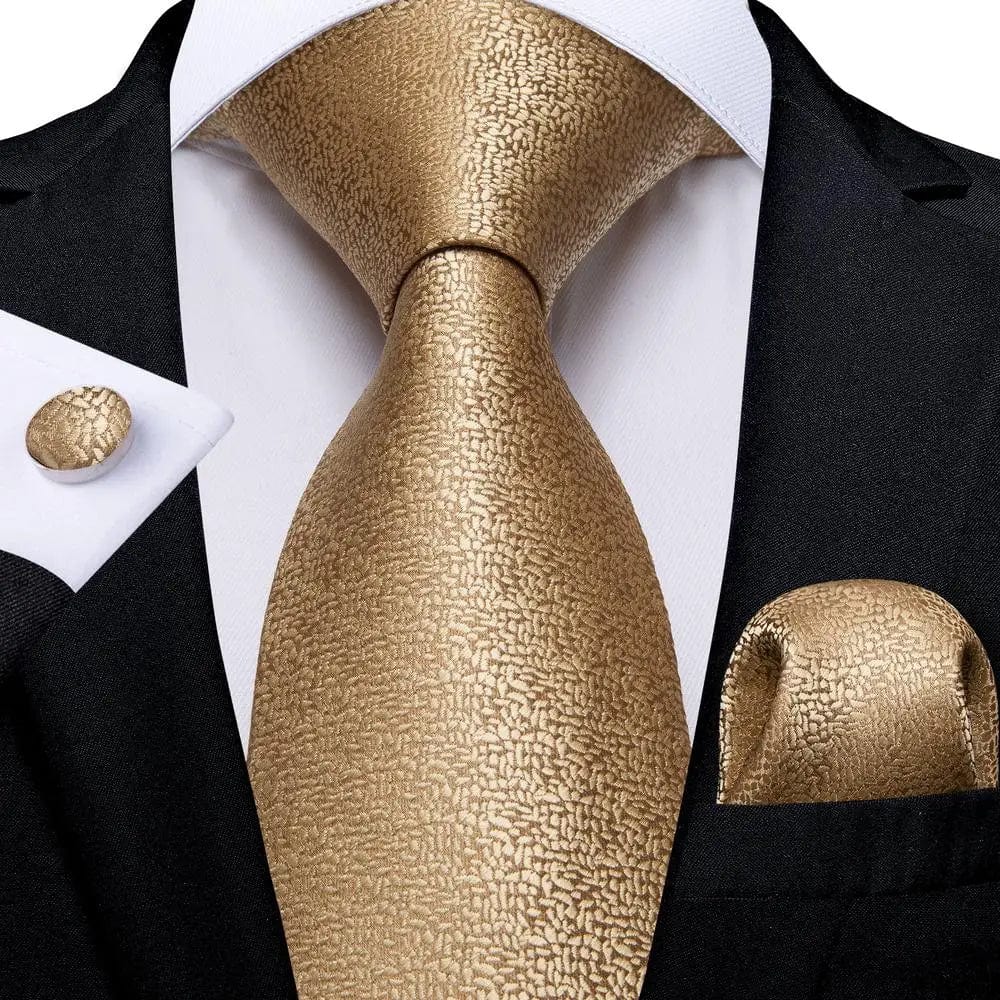 Hi-Tie solid gold yellow silk tie set for men including handkerchief and cufflinks, perfect for wedding or business attire.