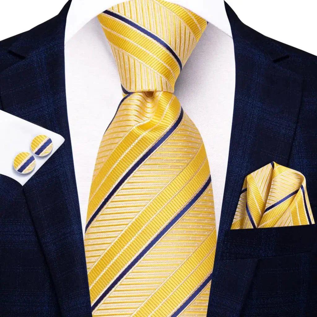 Hi-Tie solid gold yellow silk tie set with matching handkerchief and cufflinks for men, ideal for wedding or business attire.