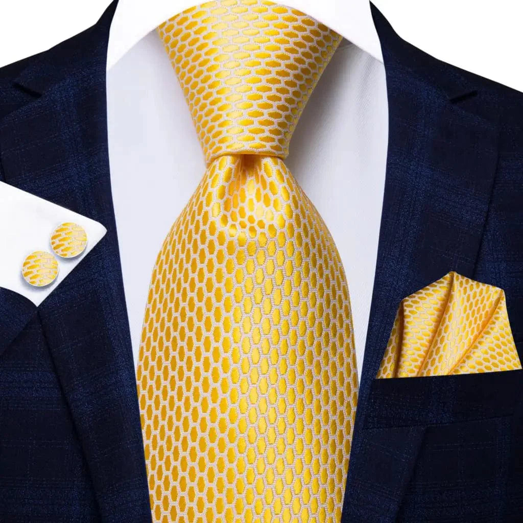 Hi-Tie solid gold yellow silk tie set with matching handkerchief and cufflinks, perfect for formal weddings and business attire.
