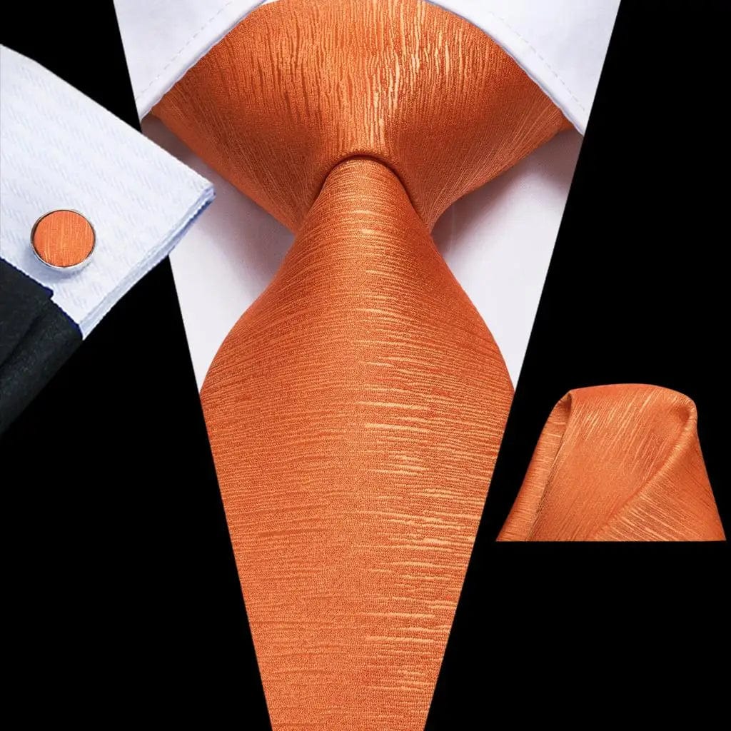 Solid gold yellow silk tie set with matching handkerchief and cufflinks for men, perfect for weddings and business occasions.