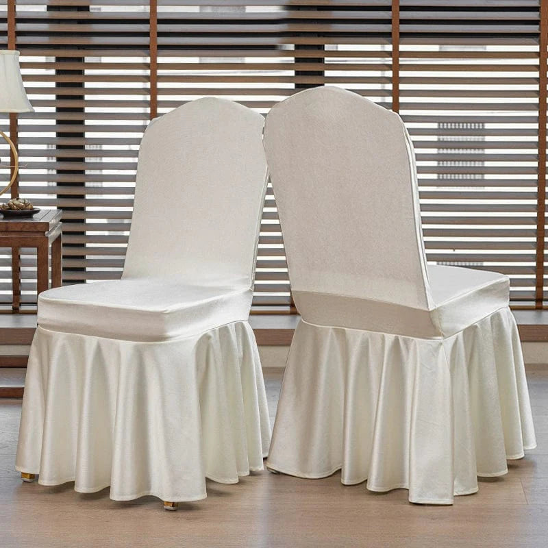 High-end satin bow chair cover for hotel, wedding, and banquet events, featuring elegant design and luxurious fabric.