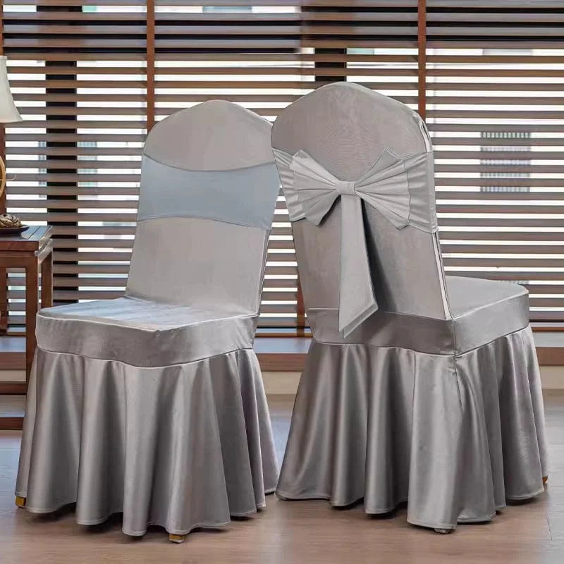 High-end satin Showlu Fashion Store bow chair cover on a banquet chair for hotel wedding events.
