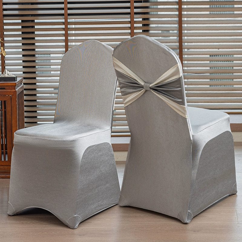 High-end satin bow chair cover for hotel, wedding, and banquet events with elegant bow design and luxurious fabric.