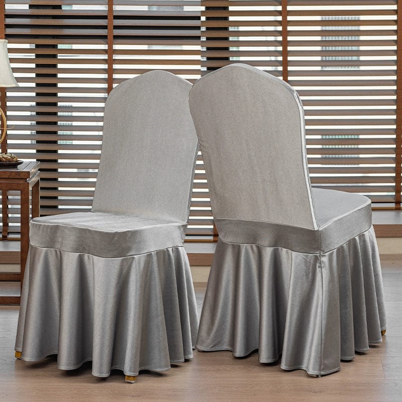 High-end satin bow chair cover for hotel, wedding, and banquet events, featuring elegant design and luxurious fabric.