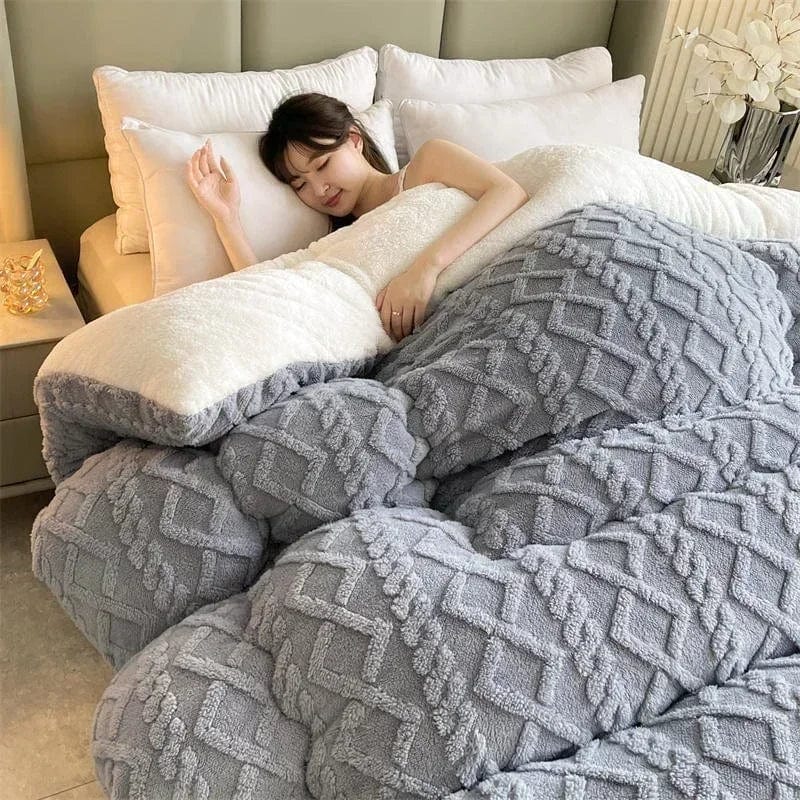 Zeby artificial lamb cashmere weighted blanket, thick winter duvet quilt for cozy warmth and comfort on a bed.