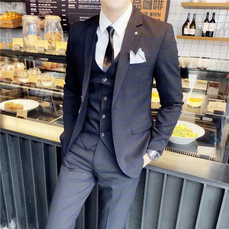 Showlu Men's British Slim Fit Three-Piece Suit with jacket, vest, and trousers, stylish and tailored for a sharp look.