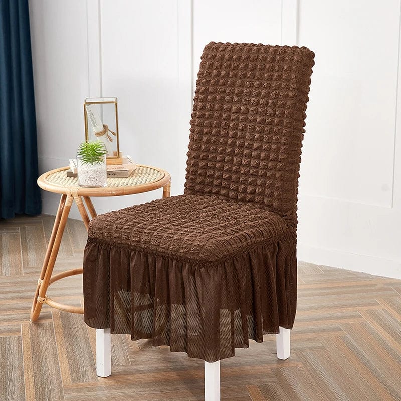 Seersucker dining chair cover with stretch skirt and elastic fit, perfect for banquet or wedding chair decoration.