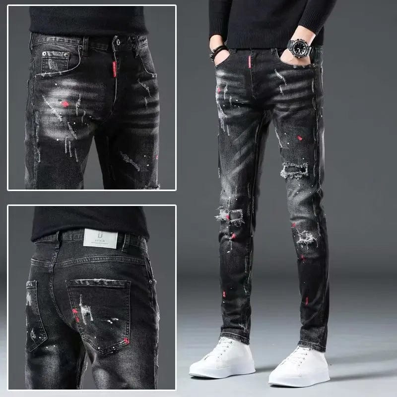 Showlu men's black skinny jeans with ripped details and paint splash designs, casual high-street fashion denim pants.