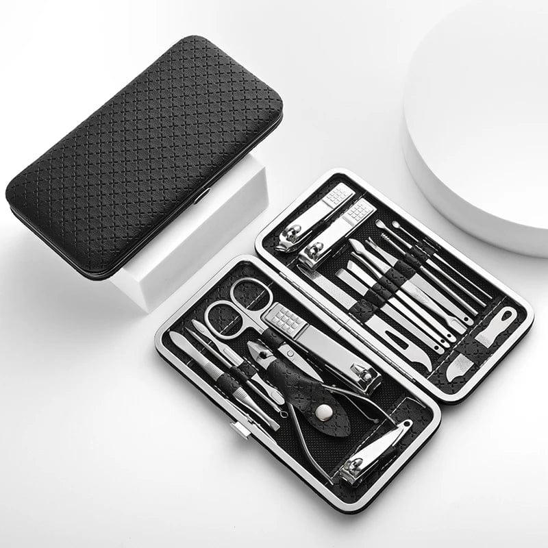 Showlu 18-piece stainless steel manicure set with leather case including nail clippers, dead skin pliers, eyebrow clipper, and tools.