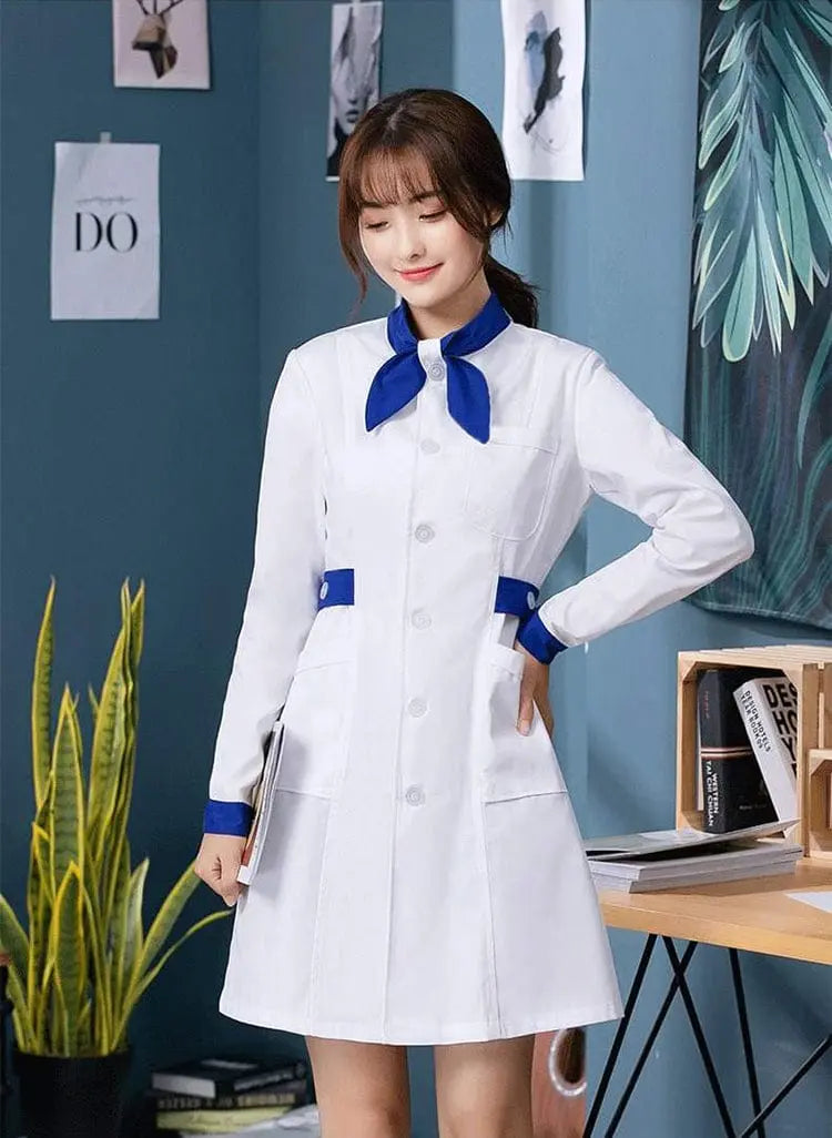 White Showlu female nursing scrubs dress with bow tie, hospital uniform blouse and coat, designed for healthcare professionals.